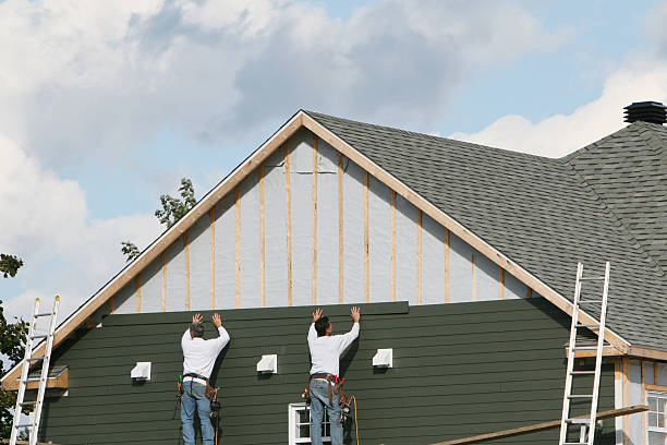 Professional Siding Replacement technician working in Ebony, VA